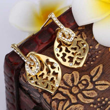 Austrian Crystal earrings yellow hollow stud earrings orecchini love 141 MP